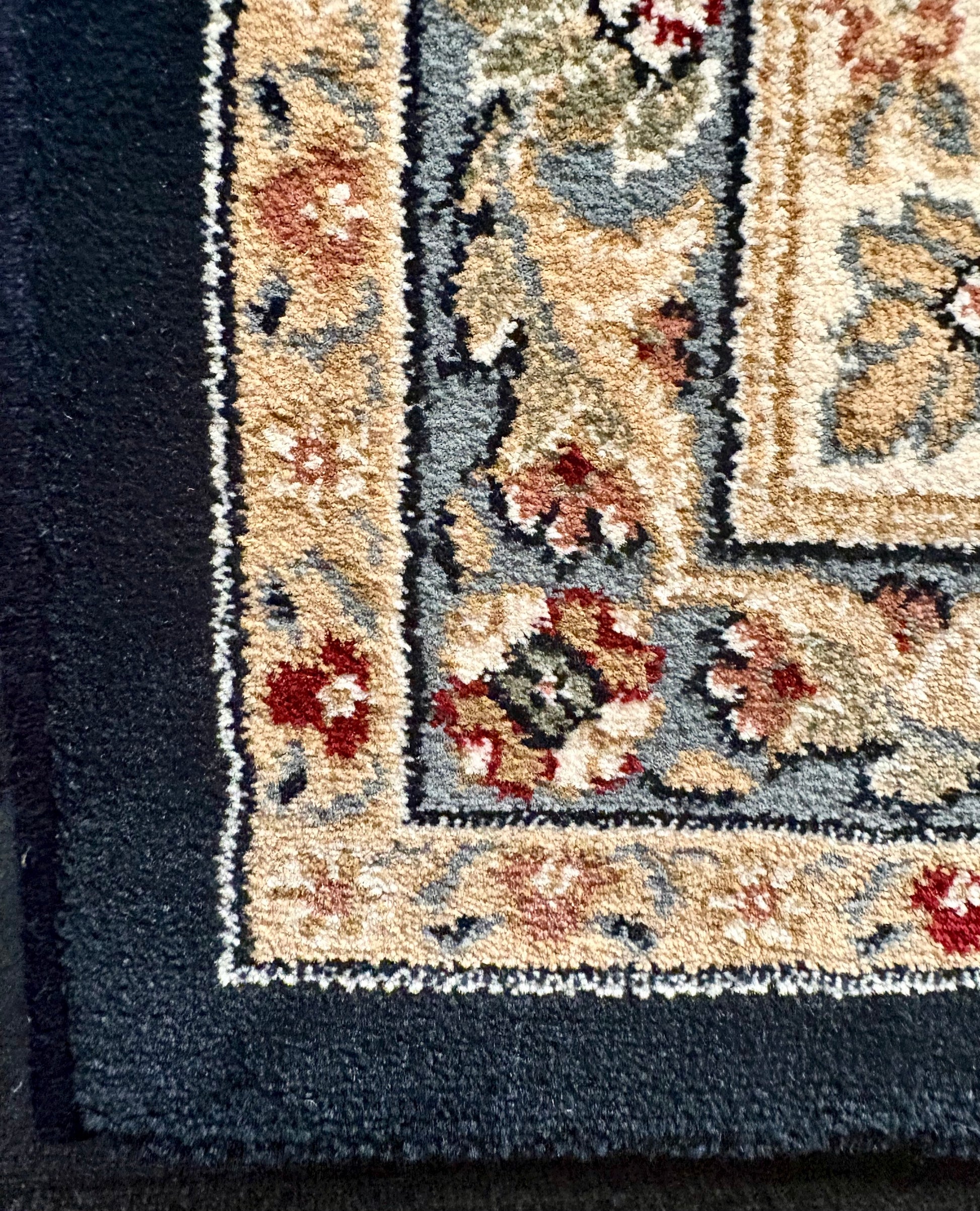 The Davinci Isfahan Blue machine-made Persian rug offers lasting style and durability, expertly crafted with heat-set polypropylene for enduring comfort. Colours, dark blues, beiges, browns. 4 Sizes. Corner.