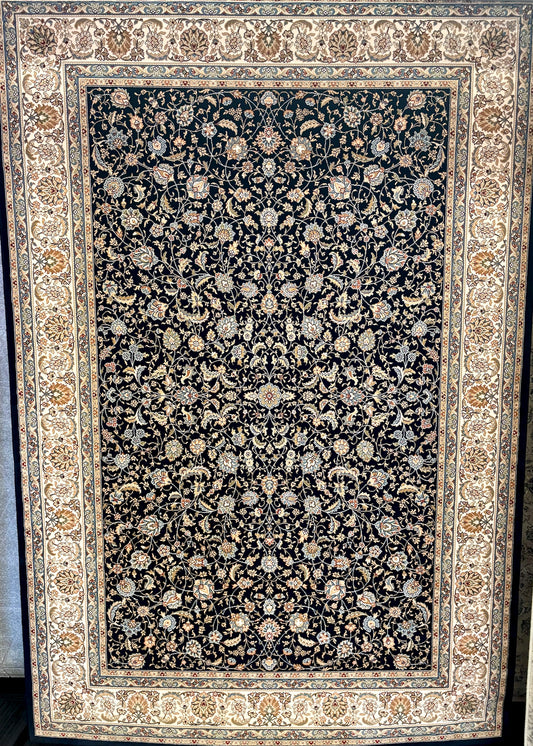 The Davinci Isfahan Blue machine-made Persian rug offers lasting style and durability, expertly crafted with heat-set polypropylene for enduring comfort. Colours, dark blues, beiges, browns. 4 Sizes. Full.