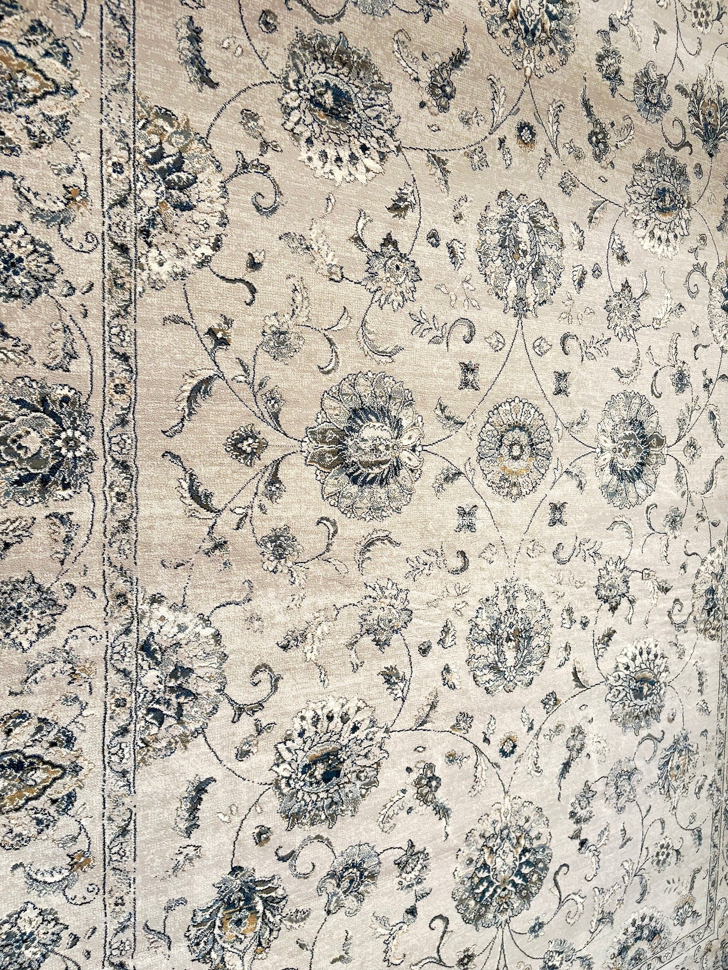 The Davinci Kashan Light Grey Persian Rug. Machine made and crafted from durable heat-set polypropylene. The classic Persian design will elevate your home decor. Colours, Greys. 4 Sizes. Side Angle.