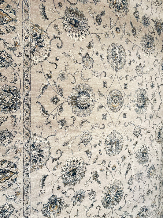 The Davinci Kashan Light Grey Persian Rug. Machine made and crafted from durable heat-set polypropylene. The classic Persian design will elevate your home decor. Colours, Greys. 4 Sizes. Side Angle.
