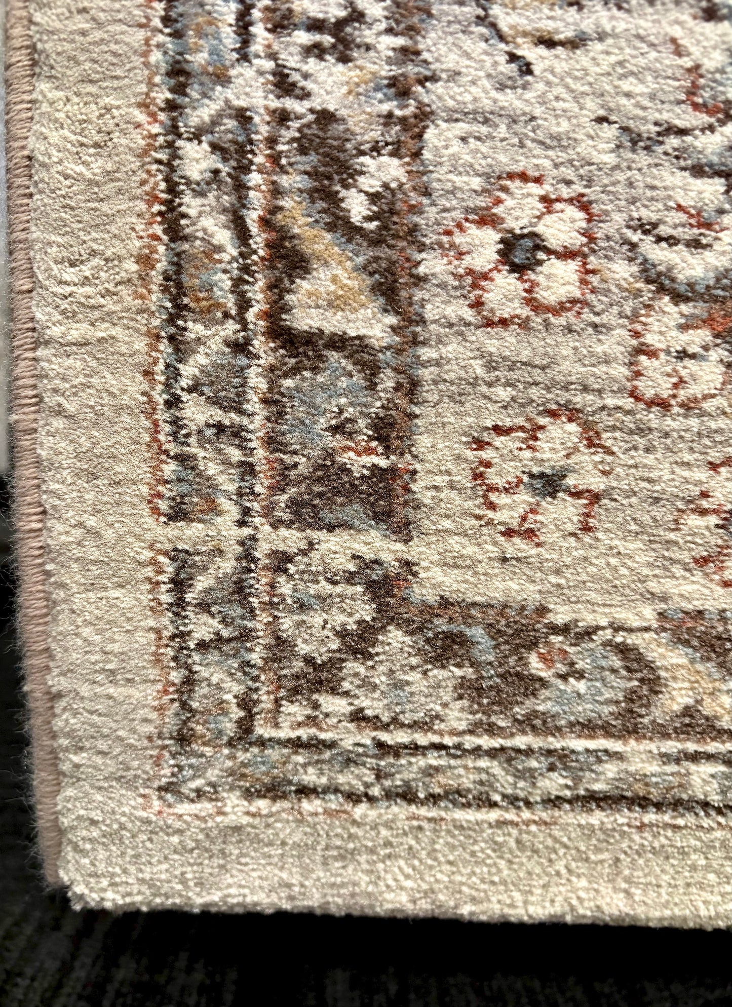 The Davinci Medallion Grey machine-made Persian rug offers traditional style and durability, expertly crafted with heat-set polypropylene for enduring comfort. Colours, Greys, light greys. 3 Sizes. Corner.