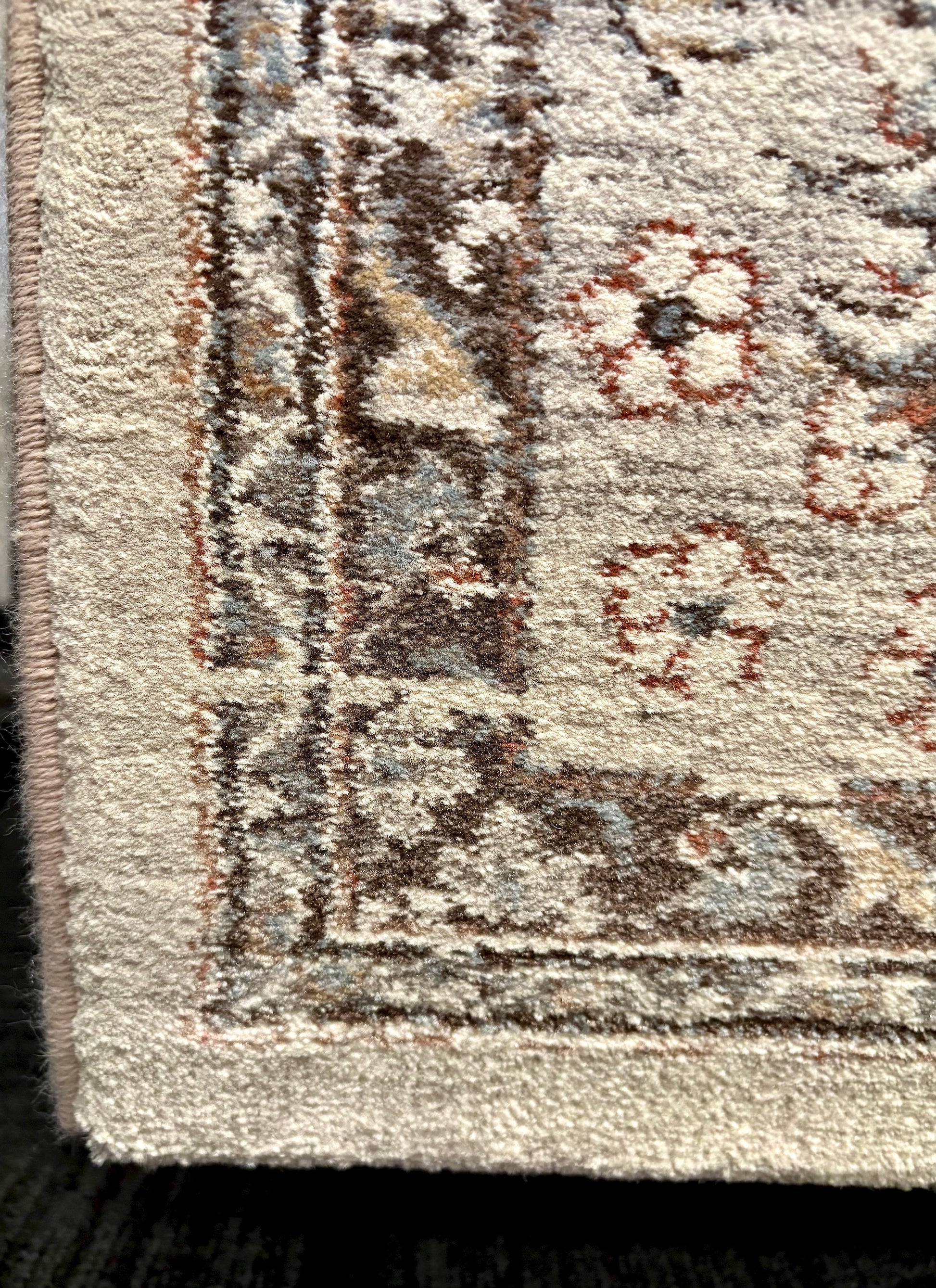 The Davinci Medallion Grey machine-made Persian rug offers traditional style and durability, expertly crafted with heat-set polypropylene for enduring comfort. Colours, Greys, light greys. 3 Sizes. Corner.
