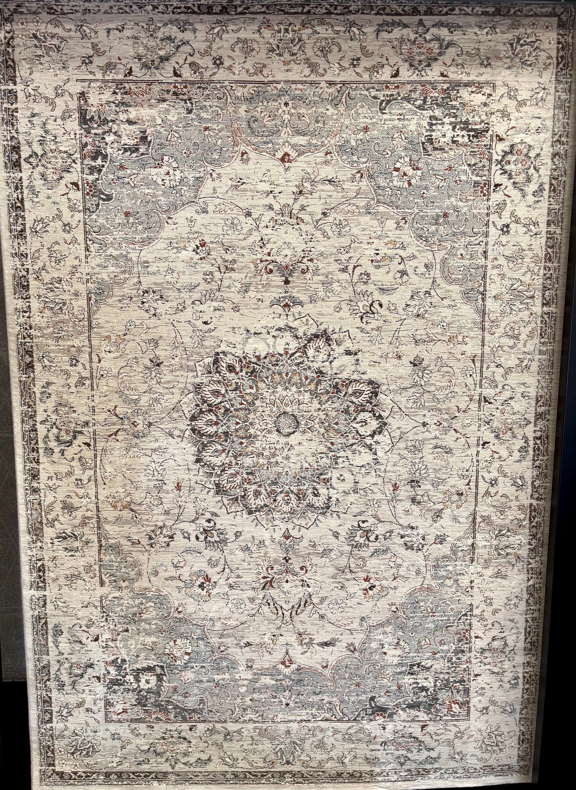 The Davinci Medallion Grey machine-made Persian rug offers traditional style and durability, expertly crafted with heat-set polypropylene for enduring comfort. Colours, Greys, light greys. 3 Sizes. Full.
