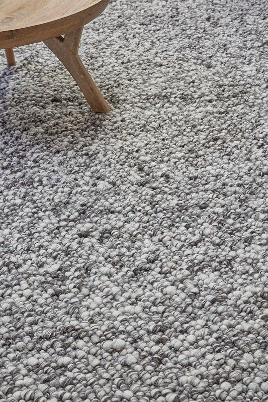 Dunes Brownie is a hand-braided wool rug, giving it a textured, luxurious feel. With a 16-18mm pile height. Colour Brown and White. Sizes 160 X 230, 200 X 290 and 240 X 340. Life.