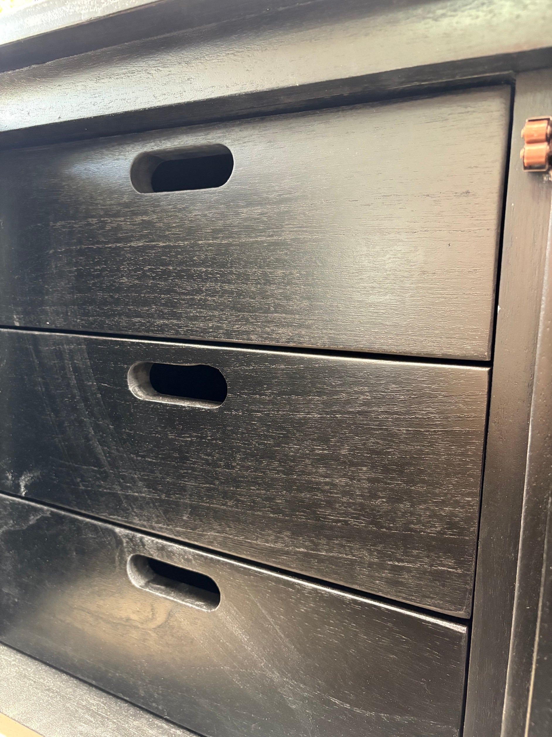 The Eastwood Black Entertainment Unit. 4 textured doors with smart storage behind the left door featuring 3 drawer. Colour Black. Measures 1800 wide X 400 depth x 650 height. Drawers.