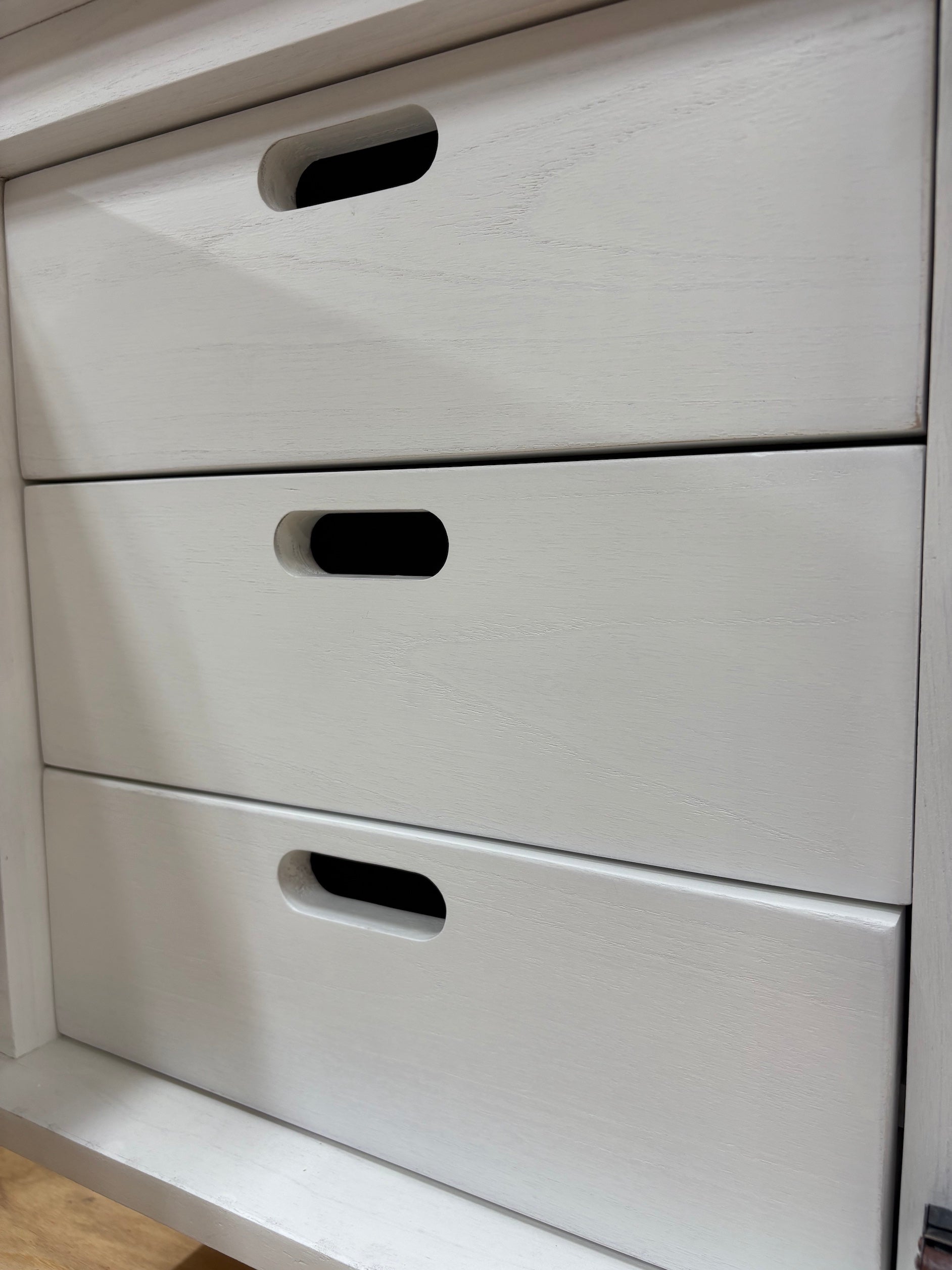 The Eastwood White Entertainment Unit. 4 textured doors with smart storage behind the left door featuring 3 drawer. Colour White. Measures 1800 wide X 400 depth x 650 height. Drawers.