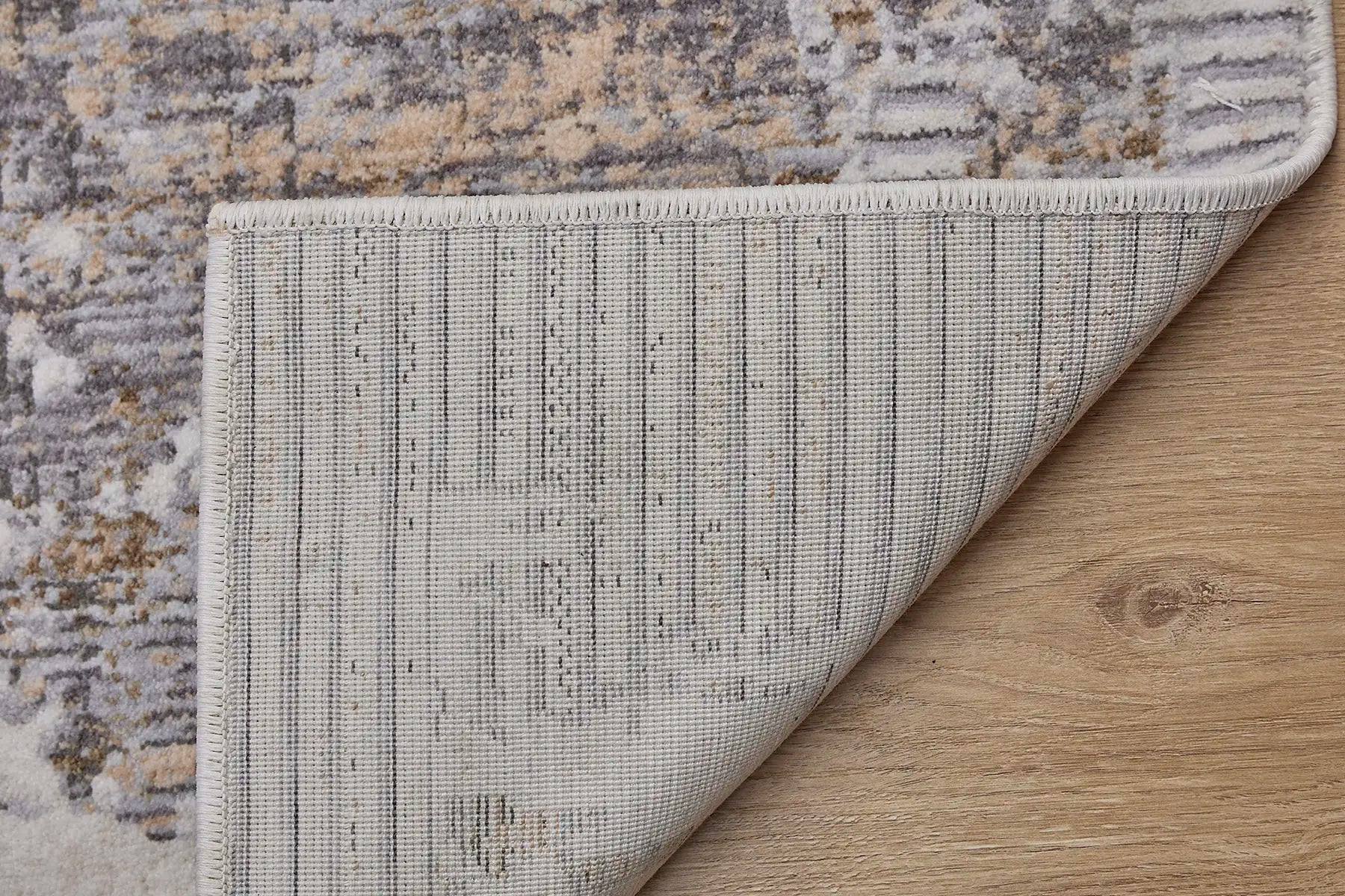 Eclipse Beige is a machine made rug. Its design boasts a modern/contemporary feel. Crafted from Polyester with a low-profile 7-9mm pile height. Colours Light greys and brownish tones. Sizes 160 X 230, 200 X 300 and 240 X 340. Fold.