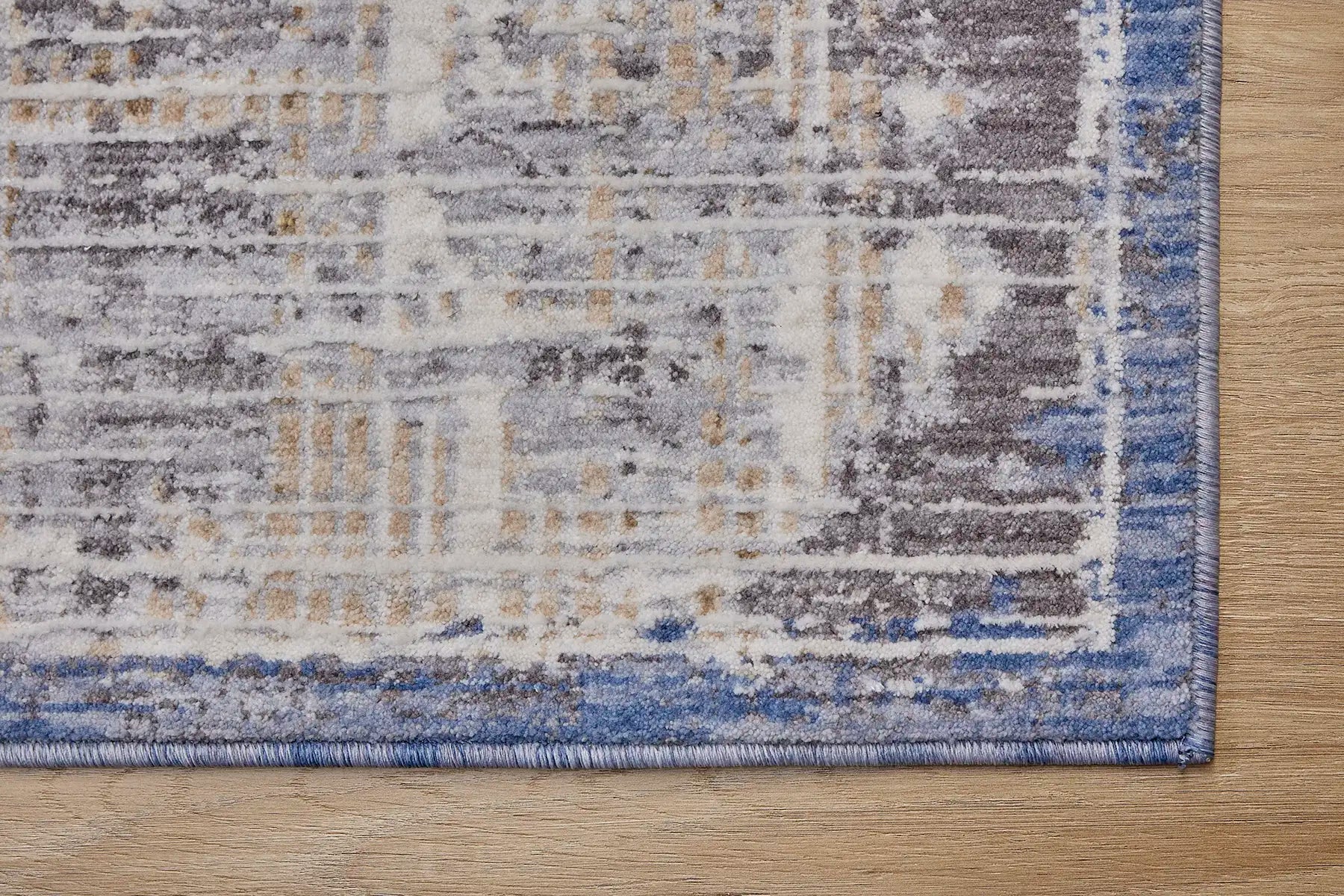 Eclipse Cross is a machine made rug. Its design boasts an abstract modern/contemporary feel. Crafted from Polyester with a low-profile 7-9mm pile height. Colours Grey,Beige and Blue tones. Sizes 160 X 230, 200 X 300 and 240 X 340. Corner.