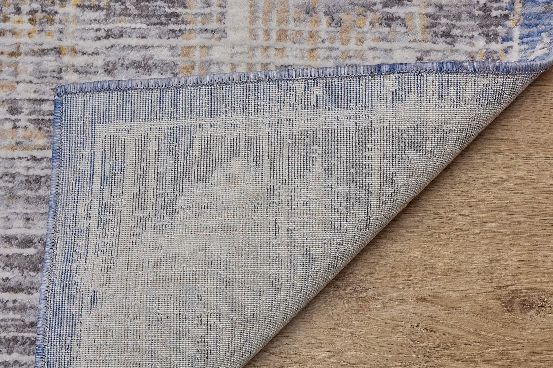 Eclipse Cross is a machine made rug. Its design boasts an abstract modern/contemporary feel. Crafted from Polyester with a low-profile 7-9mm pile height. Colours Grey,Beige and Blue tones. Sizes 160 X 230, 200 X 300 and 240 X 340. Fold.