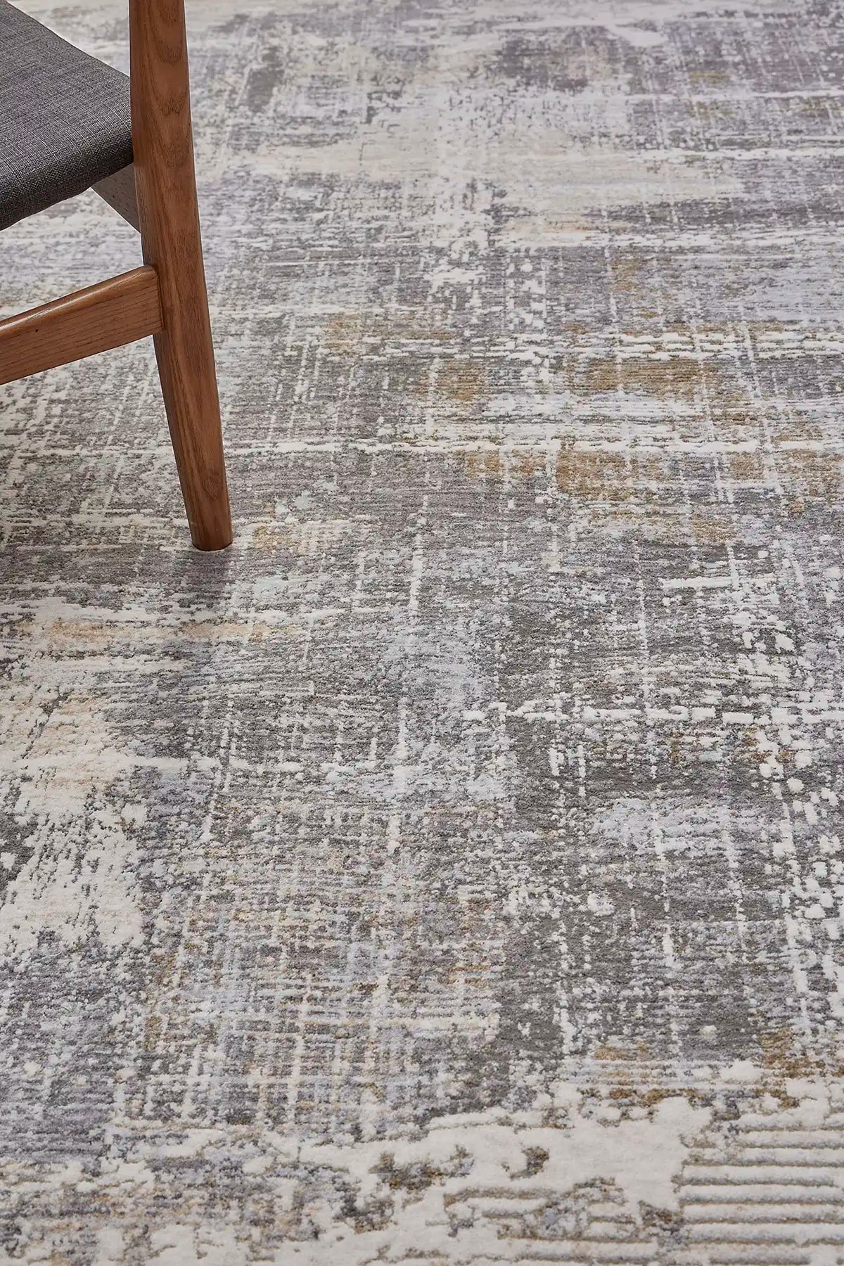 Eclipse Mixed Grey is a machine made rug. Its design boasts a abstract modern/contemporary feel. Crafted from Polyester with a low-profile 7-9mm pile height. Colours Grey and light grey tones. Sizes 160 X 230, 200 X 300 and 240 X 340. Life.