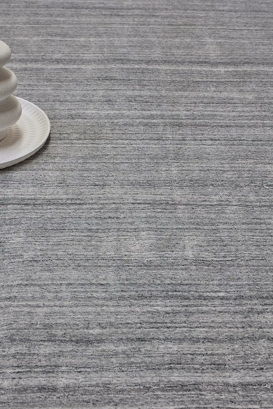 Ethnic Charcoal is a luxurious hand loomed carpet made of 80% wool and 20% bamboo silk. The finely crafted material creates a super soft texture and a smooth pile height of 16-18mm. Colour Charcoal. Sizes 160 X 230,, 200 X 290 and 240 X 340. Life.