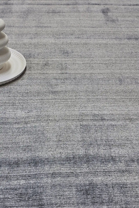 Ethnic Silver is a luxurious hand loomed carpet made of 80% wool and 20% bamboo silk. The finely crafted material creates a super soft texture and a smooth pile height of 16-18mm. Colour Silver. Sizes 160 X 230, 200 X 290 and 240 X 340. Life.