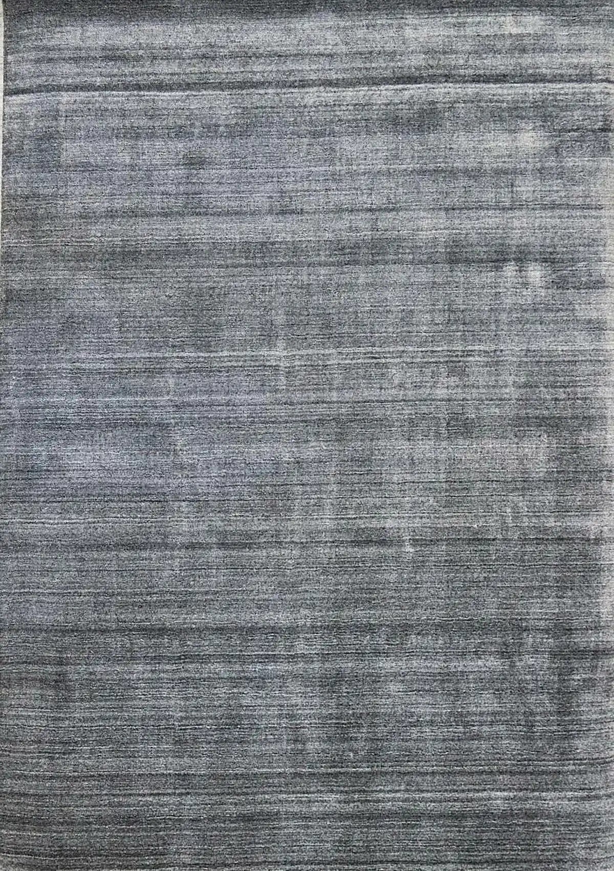Ethnic Taupe is a luxurious hand loomed carpet made of 80% wool and 20% bamboo silk. The finely crafted material creates a super soft texture and a smooth pile height of 16-18mm. Colour Silver Beige. Sizes 160 X 230, 200 X 290 and 240 X 340. Full.