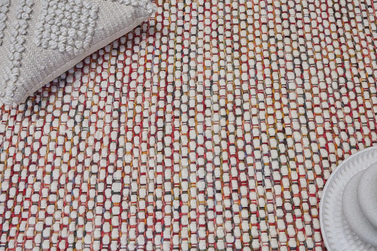 Fancy Red is a hand braided wool rug with a sumptuous 12-14mm medium pile height. Colours White with red and multi coloured accents. Sizes 160 X 230, 200 X 290, 240 X 340 and 290 X 390. Life.