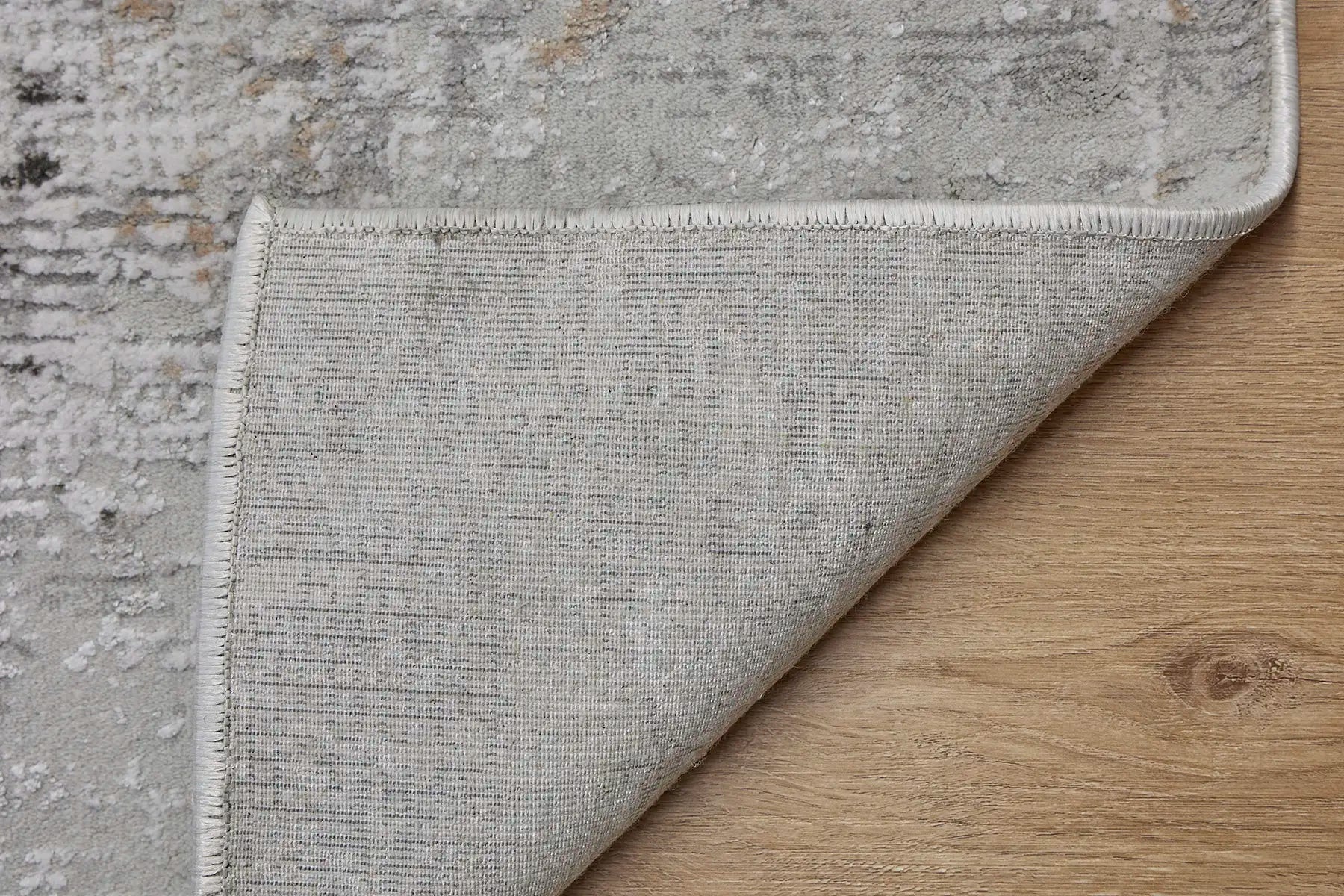 Finesse Grey is a machine made rug. Its design boasts a geometric modern/contemporary feel. Crafted from Viscose and Polyester, with a low-profile 7-9mm pile height. Colours Grey, Light Grey and Beige tones. Sizes 160 X 230, 200 X 300 and 240 X 340. Fold.