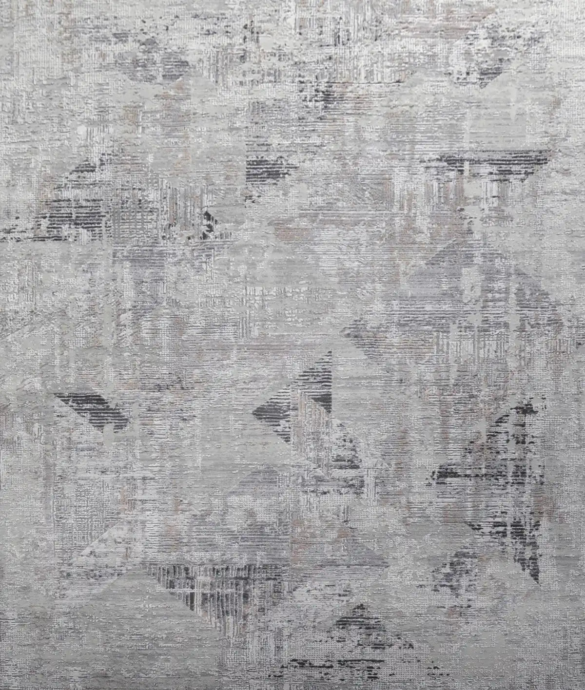 Finesse Grey is a machine made rug. Its design boasts a geometric modern/contemporary feel. Crafted from Viscose and Polyester, with a low-profile 7-9mm pile height. Colours Grey, Light Grey and Beige tones. Sizes 160 X 230, 200 X 300 and 240 X 340. Full.