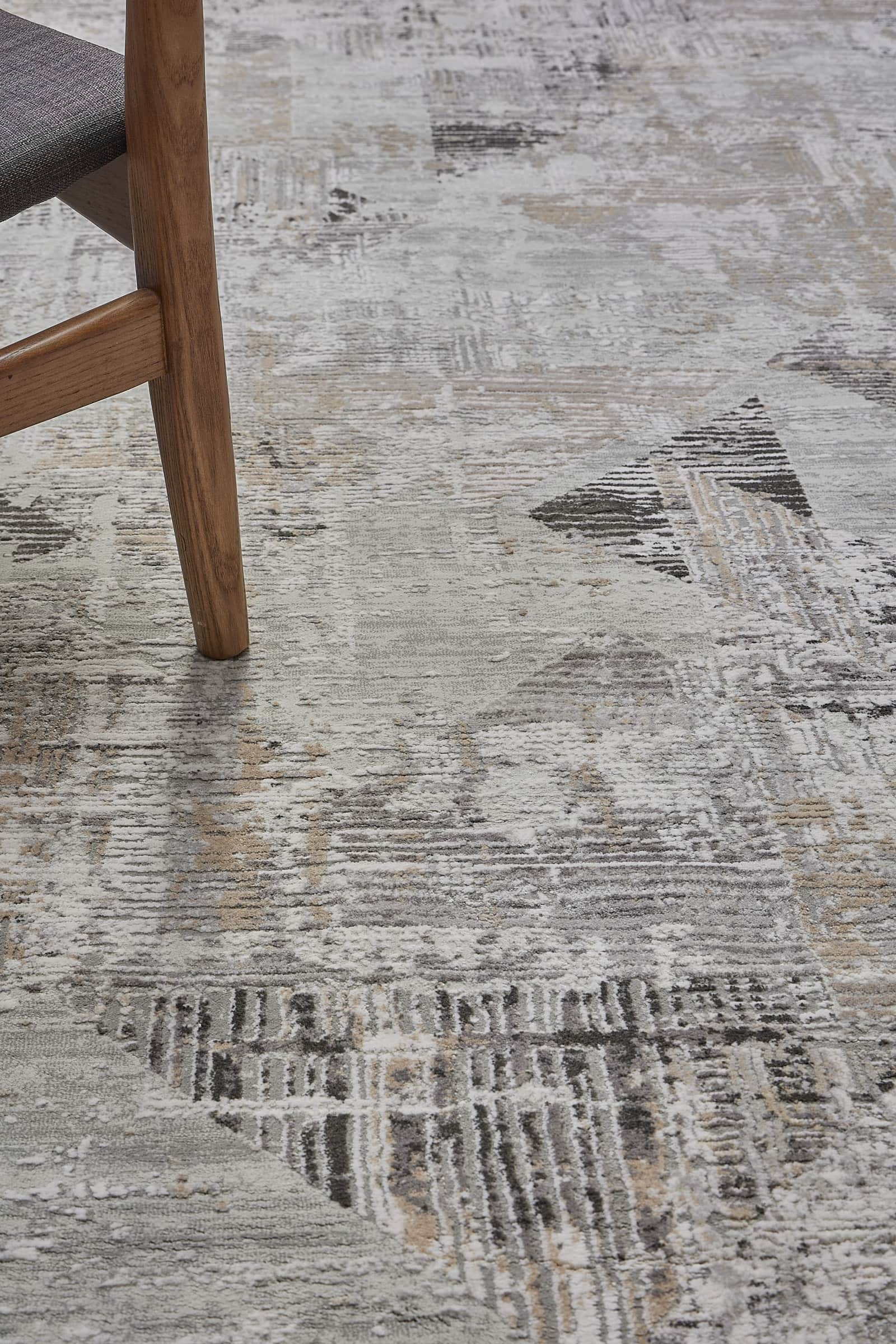 Finesse Grey is a machine made rug. Its design boasts a geometric modern/contemporary feel. Crafted from Viscose and Polyester, with a low-profile 7-9mm pile height. Colours Grey, Light Grey and Beige tones. Sizes 160 X 230, 200 X 300 and 240 X 340. Life.