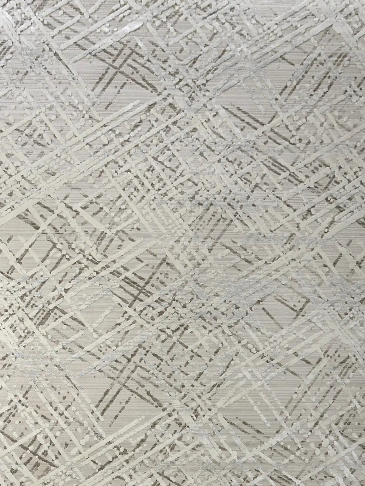 France Latte is a machine made rug. Its design boasts a abstract modern/contemporary feel. Crafted from Polyester, with a low-profile 7-9mm pile height. Colours, Light Grey and Grey tones. Sizes 160 X 230, 200 X 290, 240 X 340 and 300 X 400. Full.