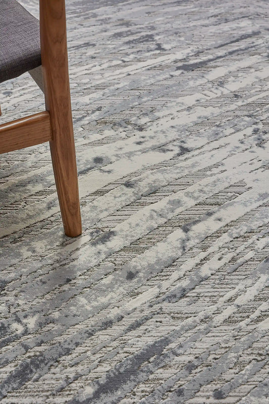 France Platinum is a machine made rug. Its design boasts a modern/contemporary feel. Crafted from Polyester, with a low-profile 7-9mm pile height. Colours, Light Grey, White and Grey tones. Sizes 160 X 230, 200 X 290, 240 X 340 and 300 X 400. Life.