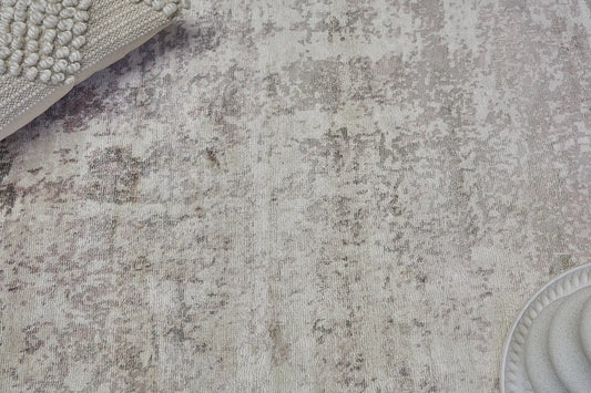 Fusion Taupe is a handcrafted rug made of luxurious bamboo silk and viscose. It features a textured, intricate, and opulent weave with a pile height of 12-14mm. Colours Grey, Light Grey and Beige Blend. Sizes 160 X 230, 200 X 290 and 240 X 340. Life.