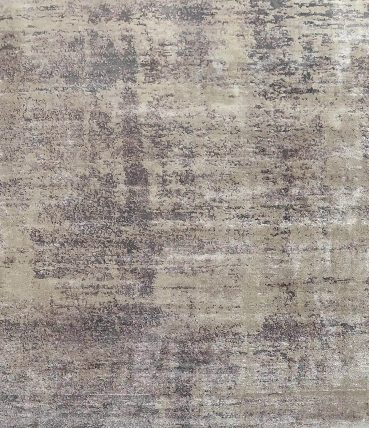 Fusion Taupe is a handcrafted rug made of luxurious bamboo silk and viscose. It features a textured, intricate, and opulent weave with a pile height of 12-14mm. Colours Grey, Light Grey and Beige Blend. Sizes 160 X 230, 200 X 290 and 240 X 340. Full.