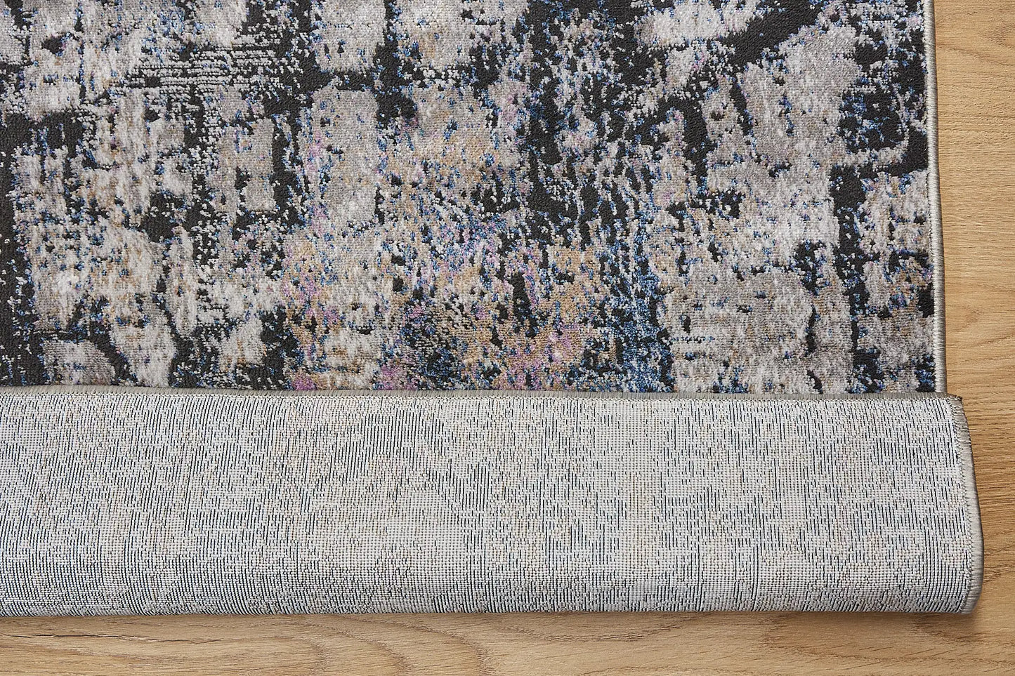 Geneva Black is a machine made rug. Its design boasts a modern/contemporary feel. Crafted from Viscose and Polyester, with a low-profile 7-9mm pile height. Colours Light Grey, Black and Blue accent tones. Sizes 160 X 230, 200 X 290 and 240 X 340. Fold.