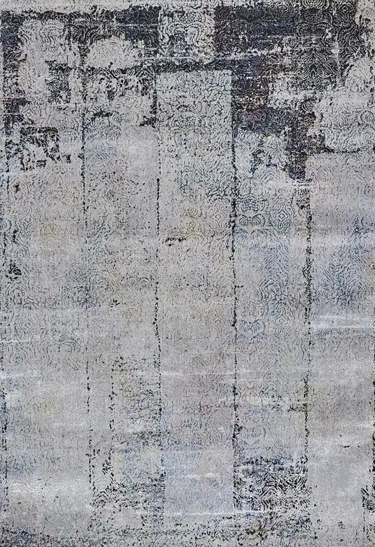 Geneva Grey is a machine made rug. Its design boasts a abstract modern/contemporary feel. Crafted from Viscose and Polyester, with a low-profile 7-9mm pile height. Colours Light Grey with Blue and Black accent tones. Sizes 160 X 230, 200 X 290 and 240 X 340. Full.