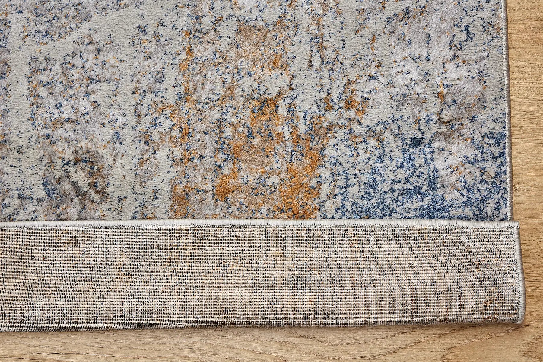 Geneva Silver is a machine made rug. Its design boasts a modern/contemporary feel. Crafted from Viscose and Polyester, with a low-profile 7-9mm pile height. Colours, Light Grey with Blue and Beige and white accent tones. Sizes 160 X 230, 200 X 290 and 240 X 340. Fold.