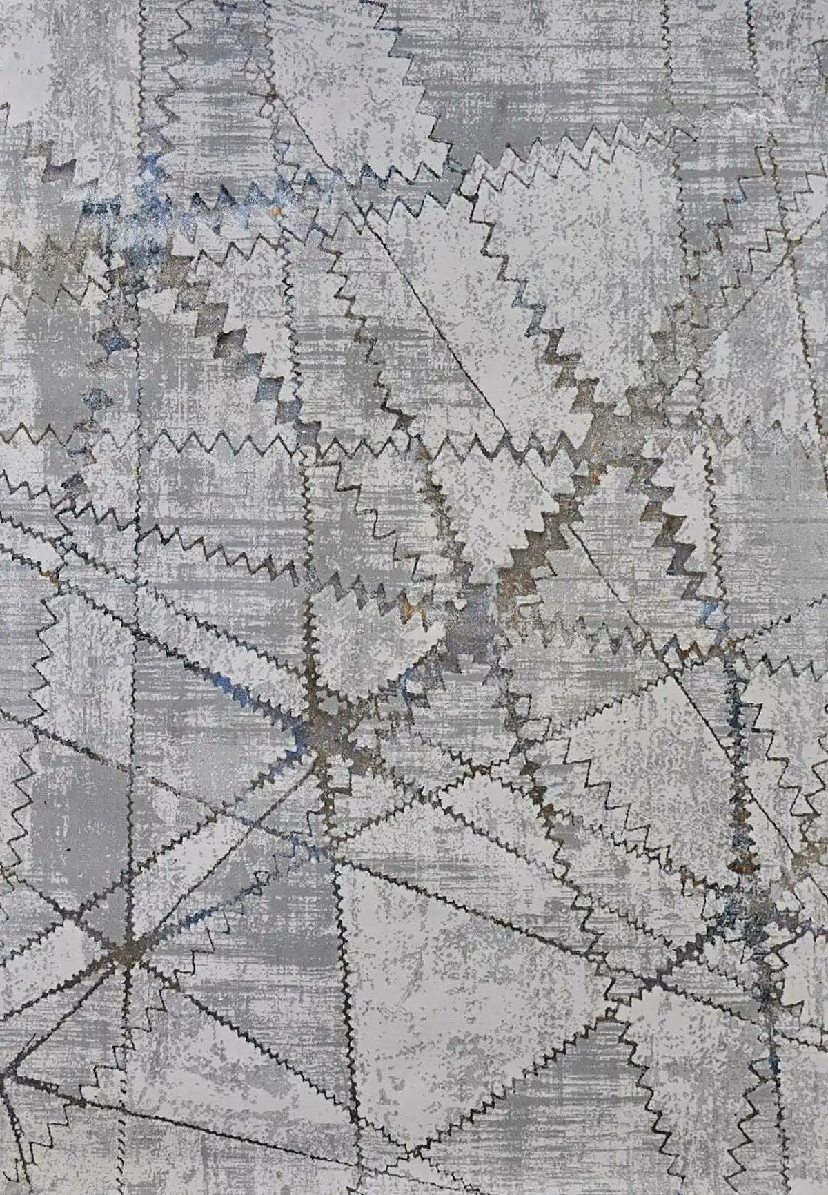 Geneva Taupe is a machine made rug. Its design boasts a abstract modern/contemporary feel. Crafted from Viscose and Polyester, with a low-profile 7-9mm pile height. Colours, Light Grey with Blue and white accent tones. Sizes 160 X 230, 200 X 290 and 240 X 340. Full.