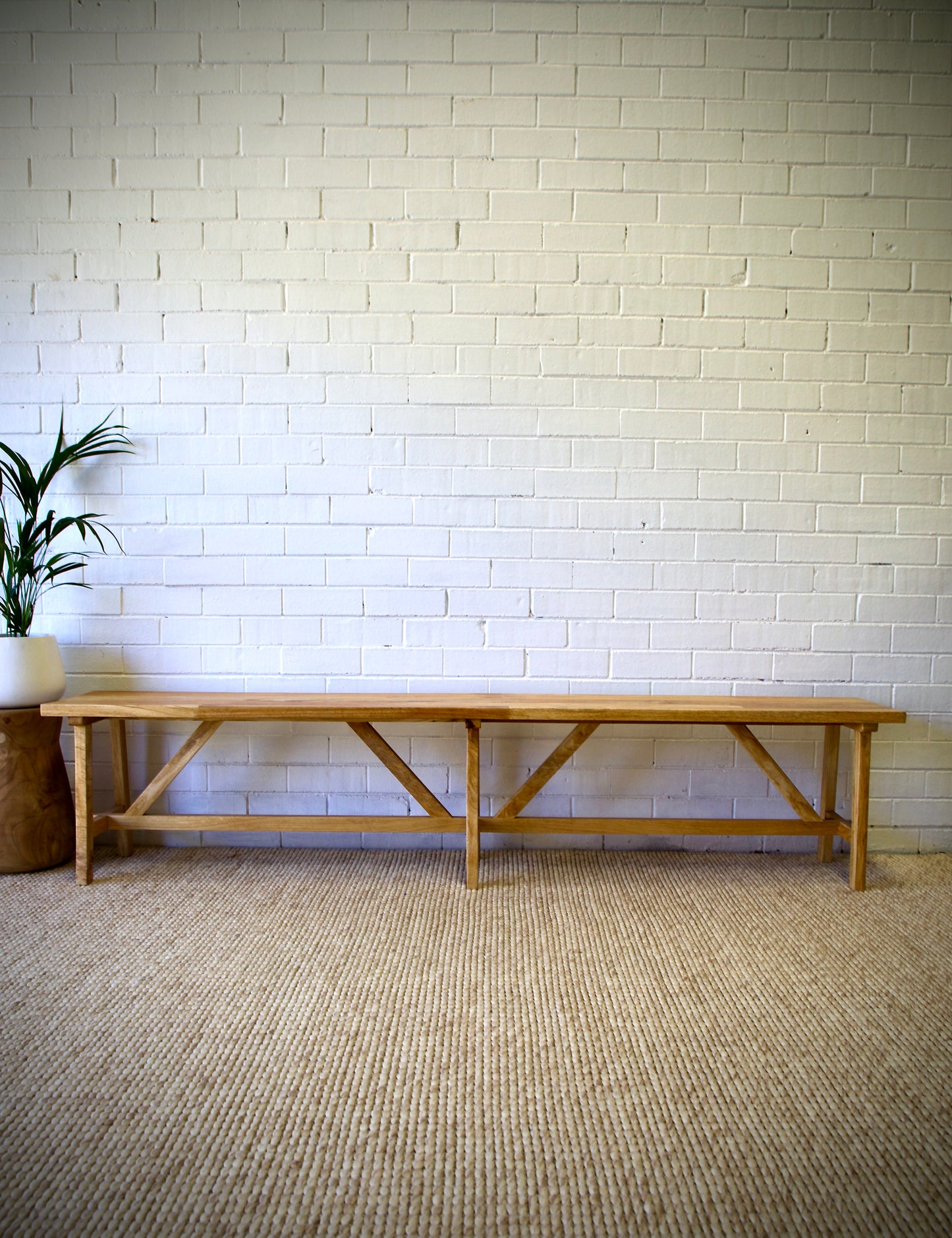 The Ginger 1800 Bench boasts a classic contemporary look.  Crafted from sustainable fruitwood. Colour natural. Measures 1800 length x 350 depth X 470 height. Front Styled.