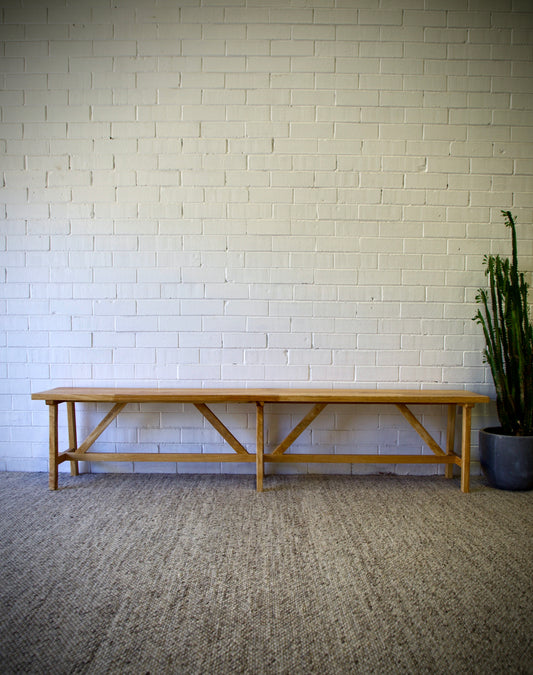 The Ginger 2200 Bench boasts a classic contemporary look.  Crafted from sustainable fruitwood. Colour natural. Measures 2200 length x 350 depth X 470 height. Front Styled.