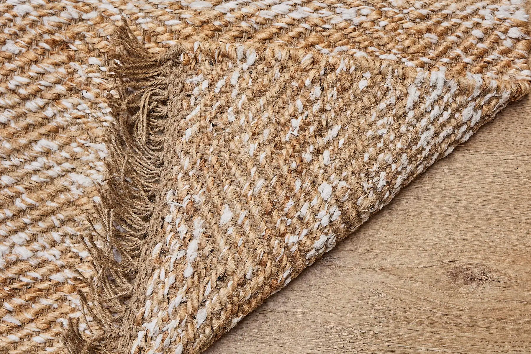 Goldfield Gardie is a rug made with panja hand woven natural coloured jute. Features a 7-9mm pile height. Colour Natural with White accents. Sizes 160 X 230, 200 X 290 and 240 X 340. Fold.