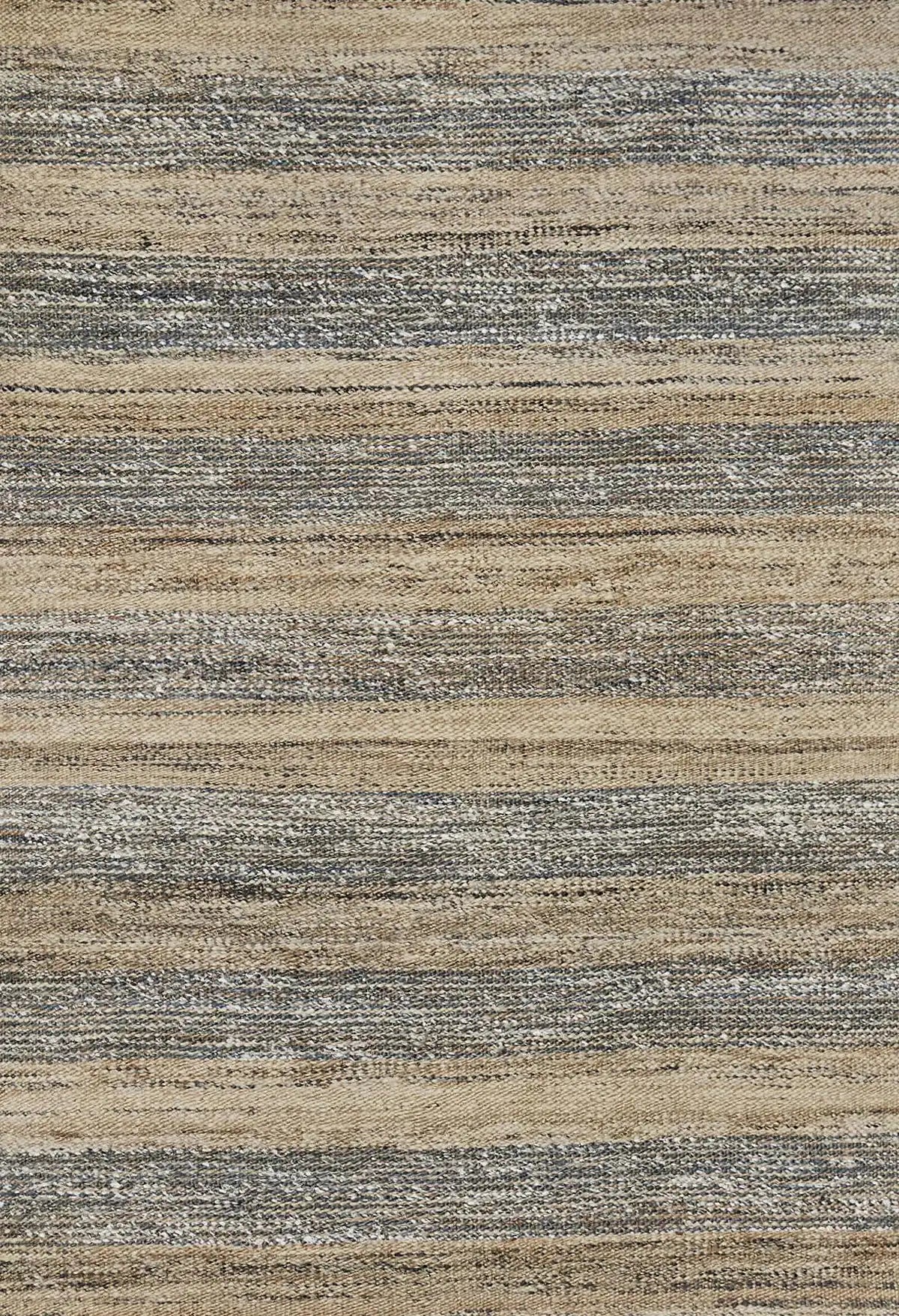 Goldfield Leo is a rug made with panja hand woven natural coloured jute. Features a 7-9mm pile height. Colour Natural with Grey and White accents. Sizes 160 x 230, 200 X 290 and 240 X 340. Full.