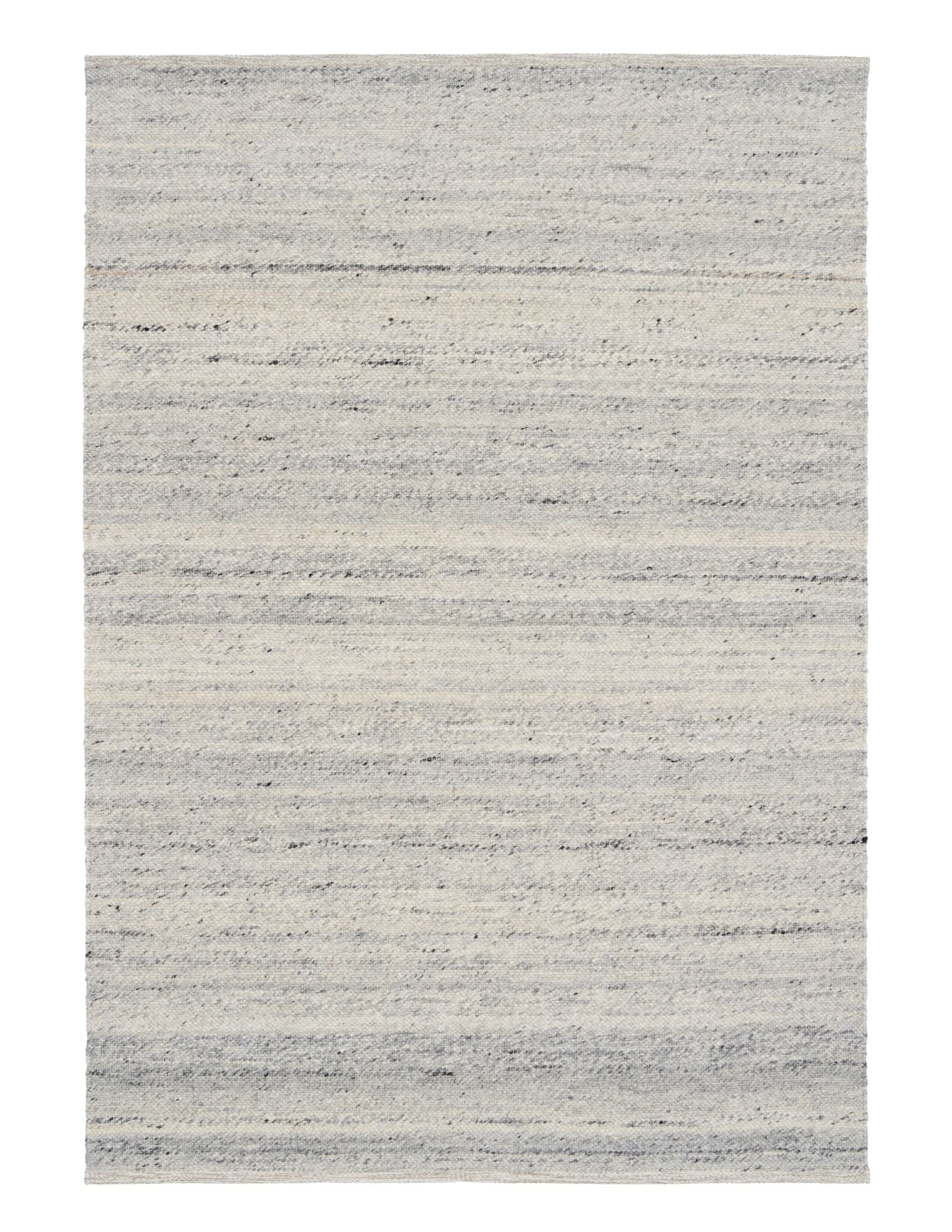 Harmony Grey Rug – hand-woven blend of wool and viscose in soft natural tones, featuring a textured finish that’s both elegant and durable. Colour White, Grey, black and brown flecks. 4 sizes. Top Plain.