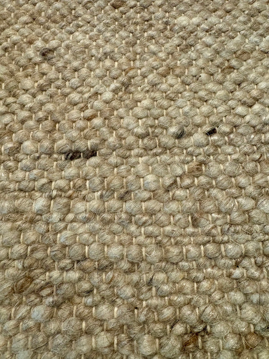 Harmony Beige Rug – hand-woven blend of wool and viscose in soft natural tones, featuring a textured finish that’s both elegant and durable. Colour White, Grey, black and brown flecks. 4 sizes. Close.
