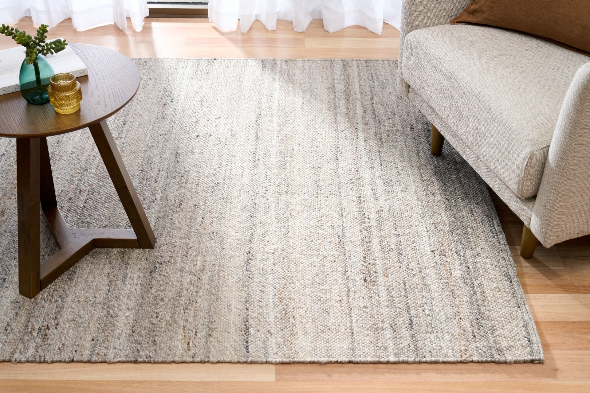 Harmony Dark Grey Rug – hand-woven blend of wool and viscose in soft natural tones, featuring a textured finish that’s both elegant and durable. Colour White, Grey, black and brown flecks. 3 sizes. Life.