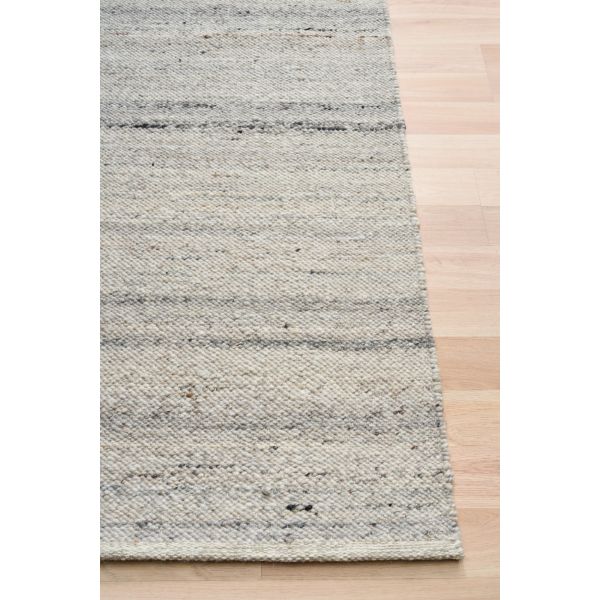 Harmony Katana Rug – hand-woven blend of wool and viscose in soft natural tones, featuring a textured finish that’s both elegant and durable. Colour White, Grey, black and brown flecks. 4 sizes. Corner.