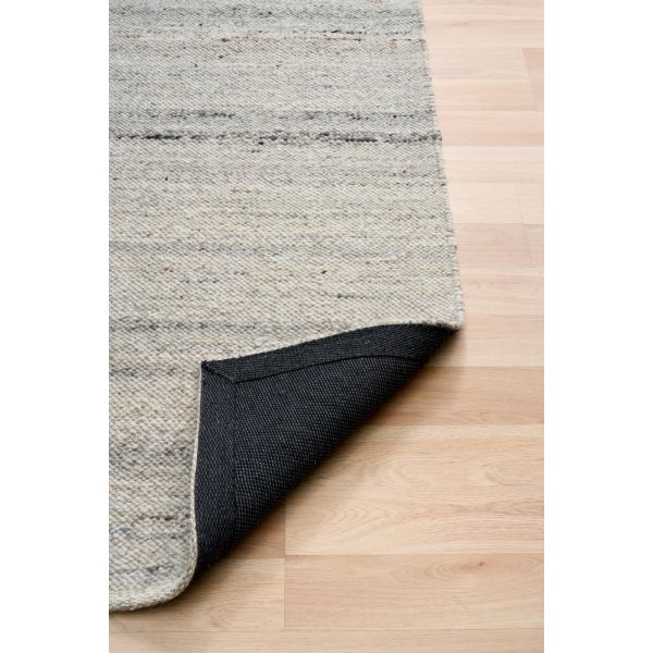 Harmony Katana Rug – hand-woven blend of wool and viscose in soft natural tones, featuring a textured finish that’s both elegant and durable. Colour White, Grey, black and brown flecks. 4 sizes. Fold.