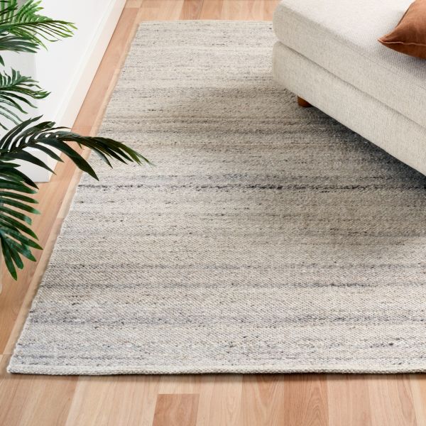 Harmony Katana Rug – hand-woven blend of wool and viscose in soft natural tones, featuring a textured finish that’s both elegant and durable. Colour White, Grey, black and brown flecks. 4 sizes. Life.