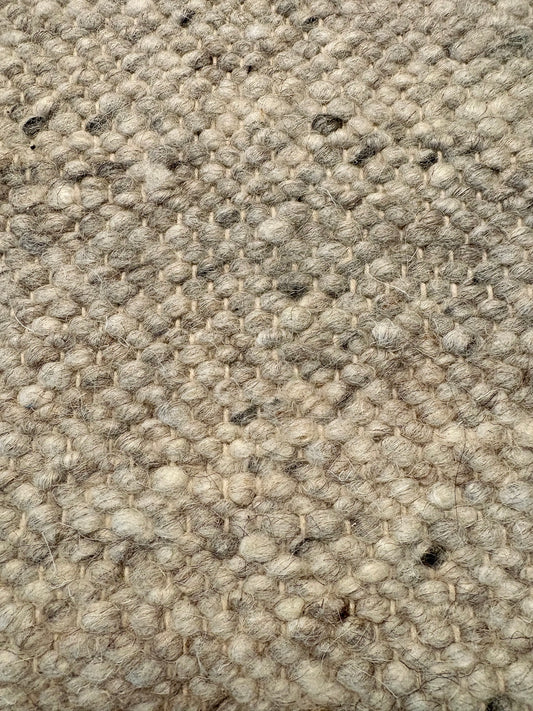 Harmony Smoke Grey Rug – hand-woven blend of wool and viscose in soft natural tones, featuring a textured finish that’s both elegant and durable. Colour White, Grey, black and brown flecks. 4 sizes. Up Close.