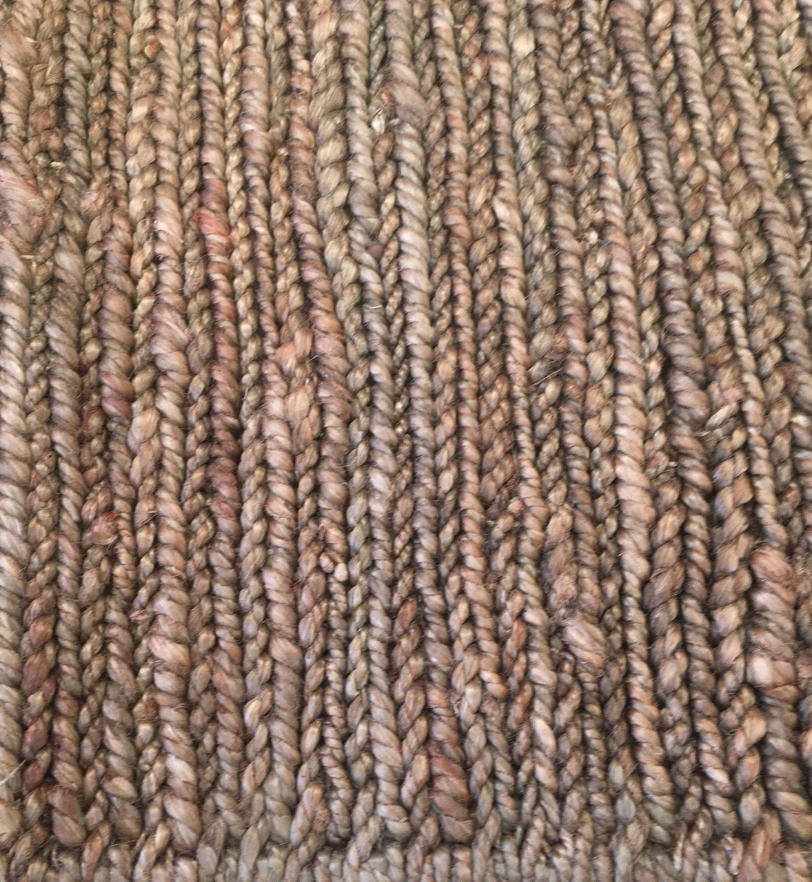 Hemp Coffee is a hand woven braided hemp rug. Colour Brown. Sizes  155 X 225,200 X 290 and 240 X 320. Close.