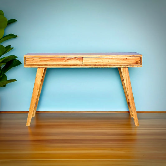 The Huron Desk - a beautifully crafted piece made from solid white cedar and supported by sleek, sturdy legs. Featuring 2 Drawers. Measures 1300 Length x 500 Depth x 670 Height. Colour Natural. Styled.