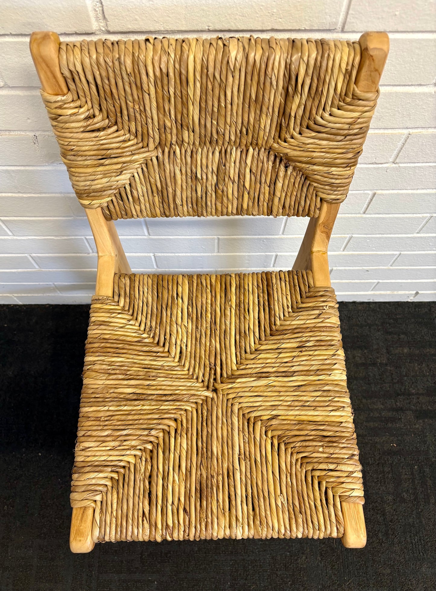 Indus with back barstool with solid teak wood frame and hand-woven natural pandan seat and back, featuring a clean, minimalist design suitable for coastal and contemporary interiors. Measures 410 Wide X 540 Depth X 670 Seat Height X 1000 Back Height. Top.