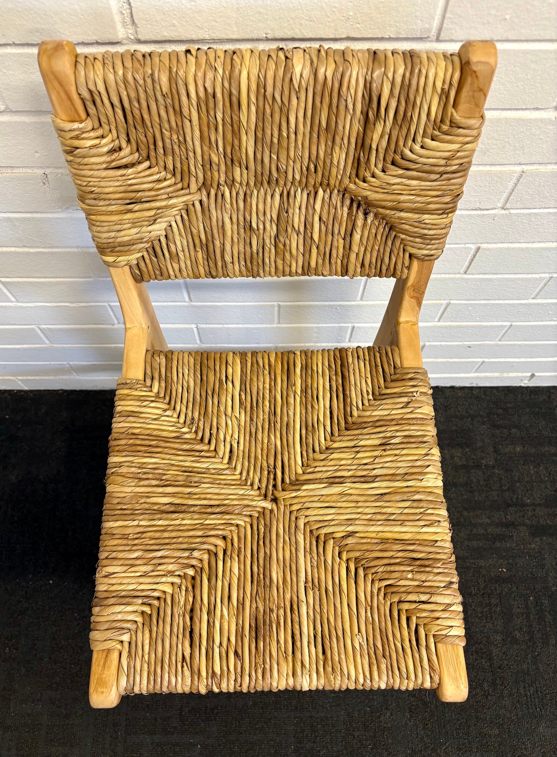 Indus with back barstool with solid teak wood frame and hand-woven natural pandan seat and back, featuring a clean, minimalist design suitable for coastal and contemporary interiors. Measures 410 Wide X 540 Depth X 670 Seat Height X 1000 Back Height. Top.