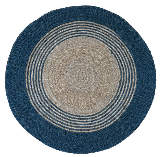 The Juno Echo Blue Round Rug. Hand Woven Braided Jute Rug. Colours natural grey base with blue. 2 sizes, 120 centimetres and 200 centimetres round. Top.