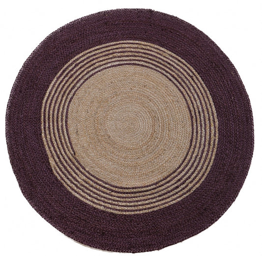 The Juno Echo Purple Round Rug. Hand Woven Braided Jute Rug. Colours natural base with purple. 2 sizes, 120 centimetres and 200 centimetres round. Top.