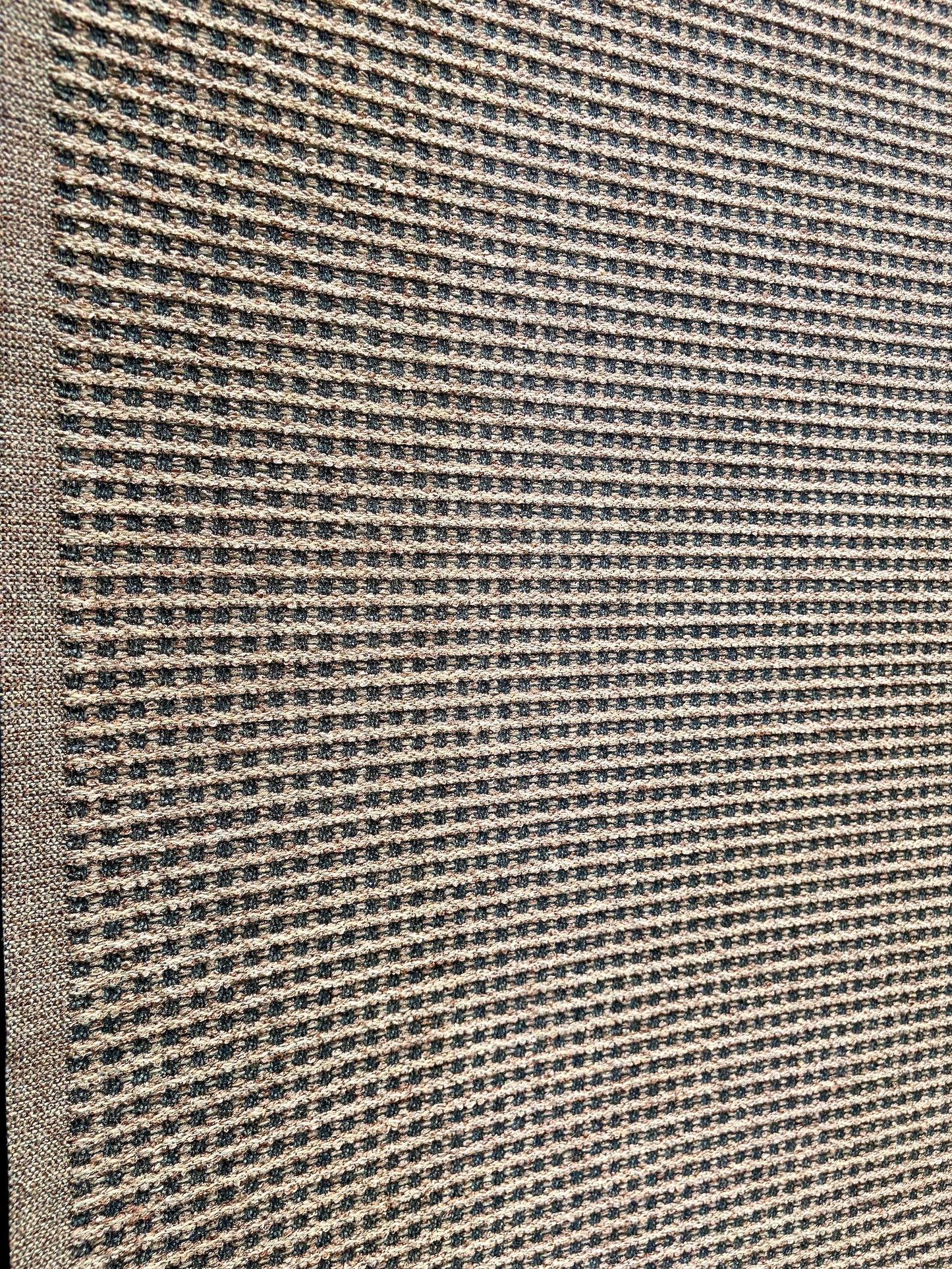 Katana Beige indoor/outdoor rug featuring Beige and light grey/gold tones and a subtle textured pattern, power-loomed from UV-stabilised polypropylene for lasting durability. Colour beige with grey and gold flecks. 3 sizes. Angle.