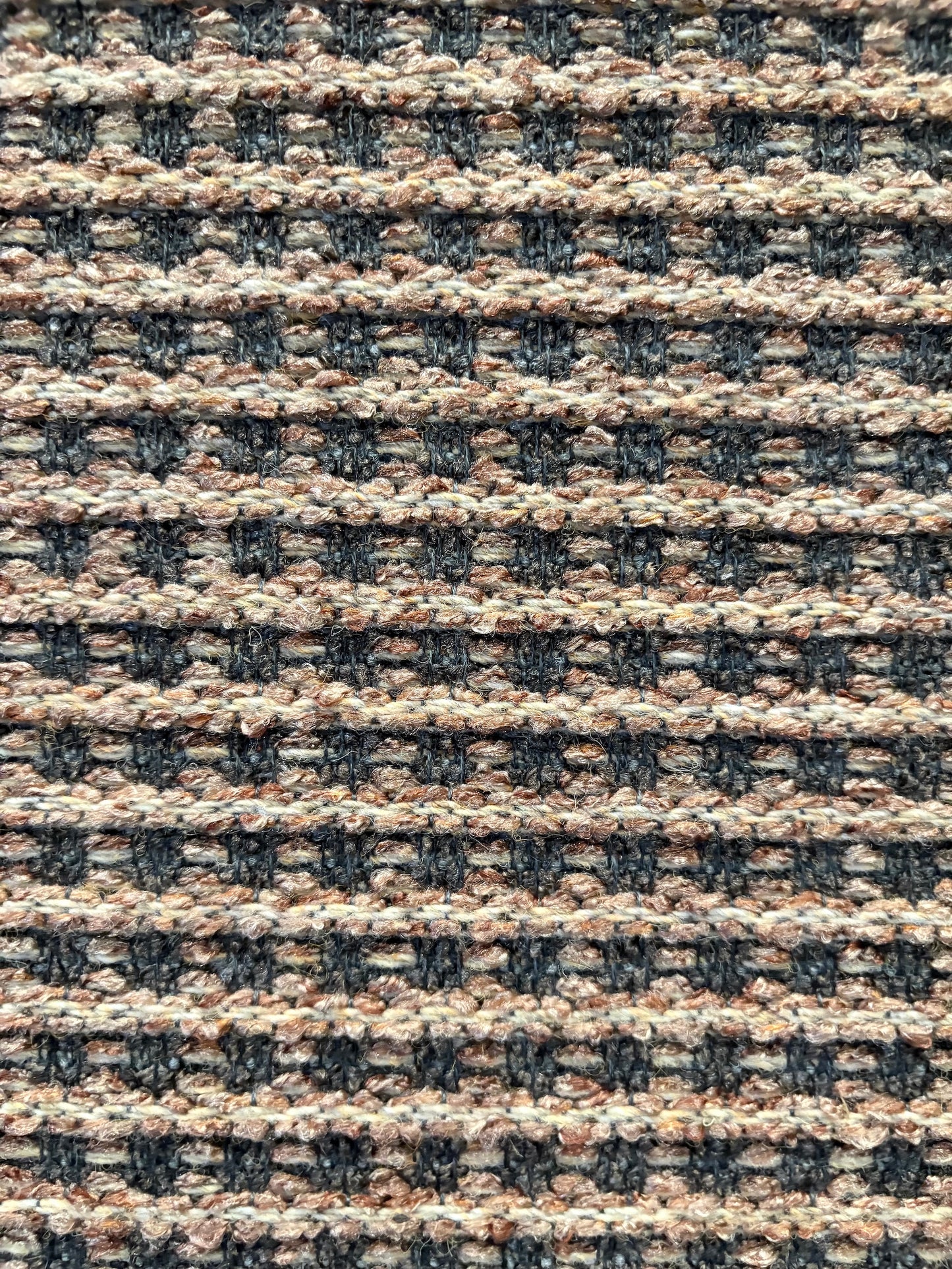 Katana Beige indoor/outdoor rug featuring Beige and light grey/gold tones and a subtle textured pattern, power-loomed from UV-stabilised polypropylene for lasting durability. Colour beige with grey and gold flecks. 3 sizes. Close.