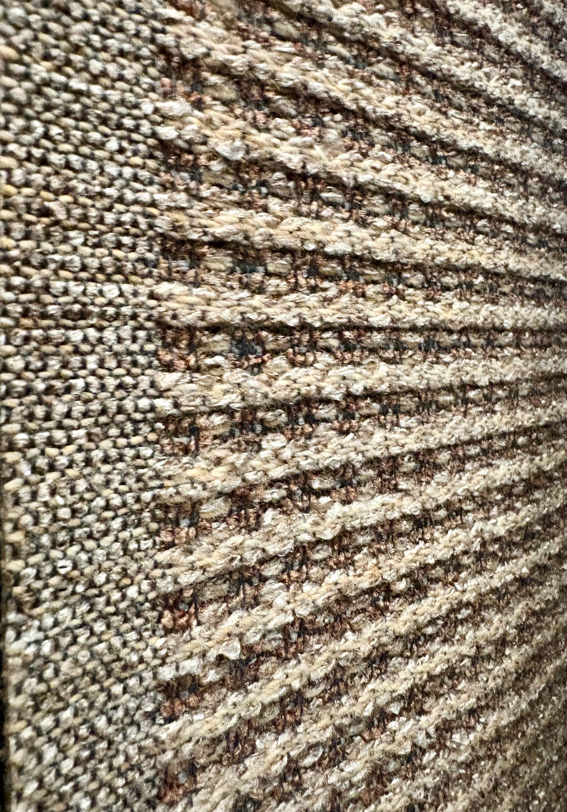 Katana Cream indoor/outdoor rug featuring soft cream and light grey tones and a subtle textured pattern, power-loomed from UV-stabilised polypropylene for lasting durability. Colour creams and light greys. 3 sizes. Side.