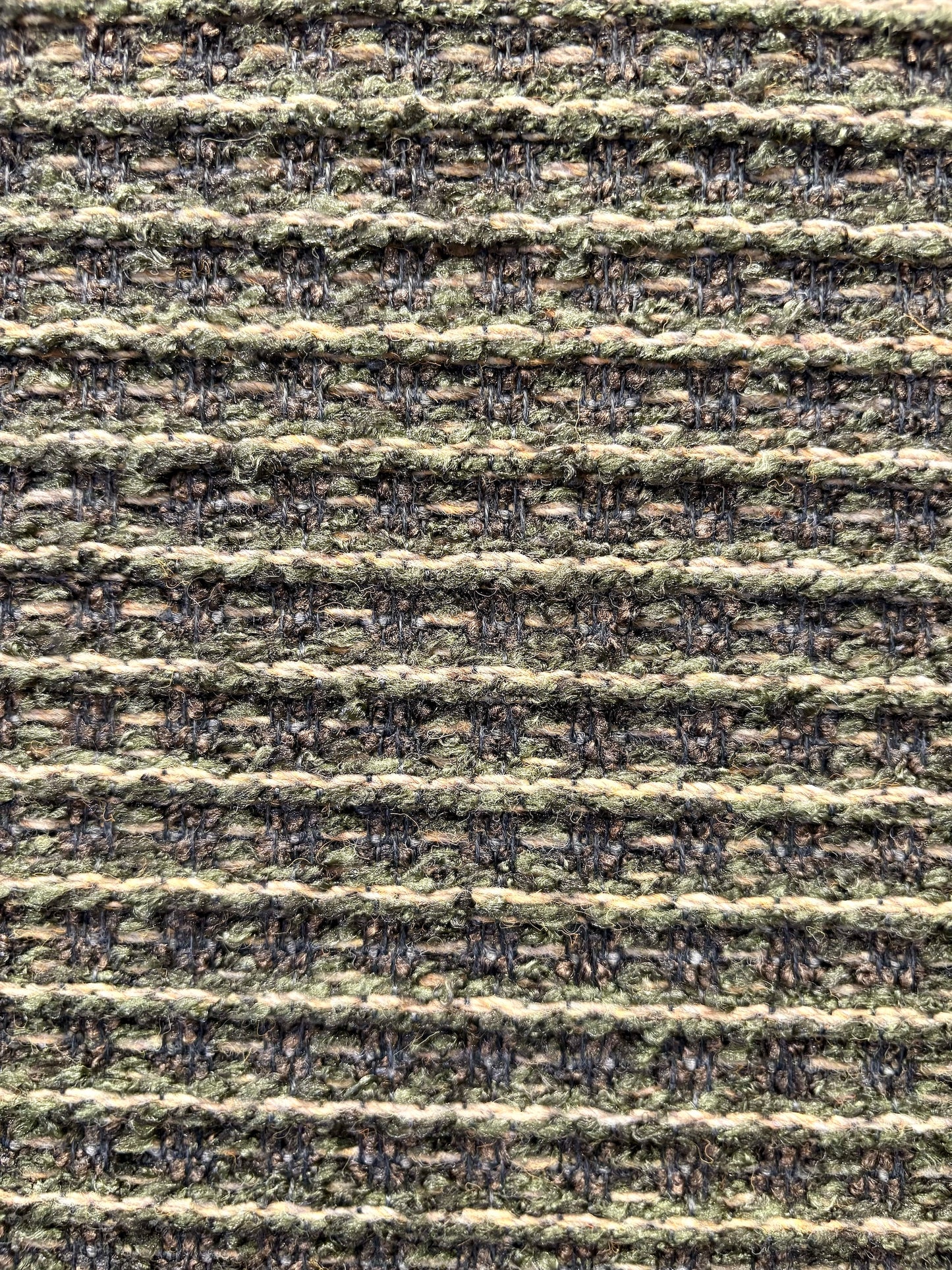 Katana Forest indoor/outdoor rug featuring deep green and light grey tones and a subtle textured pattern, power-loomed from UV-stabilised polypropylene for lasting durability. Colour forest green and light greys. 3 sizes. Close.